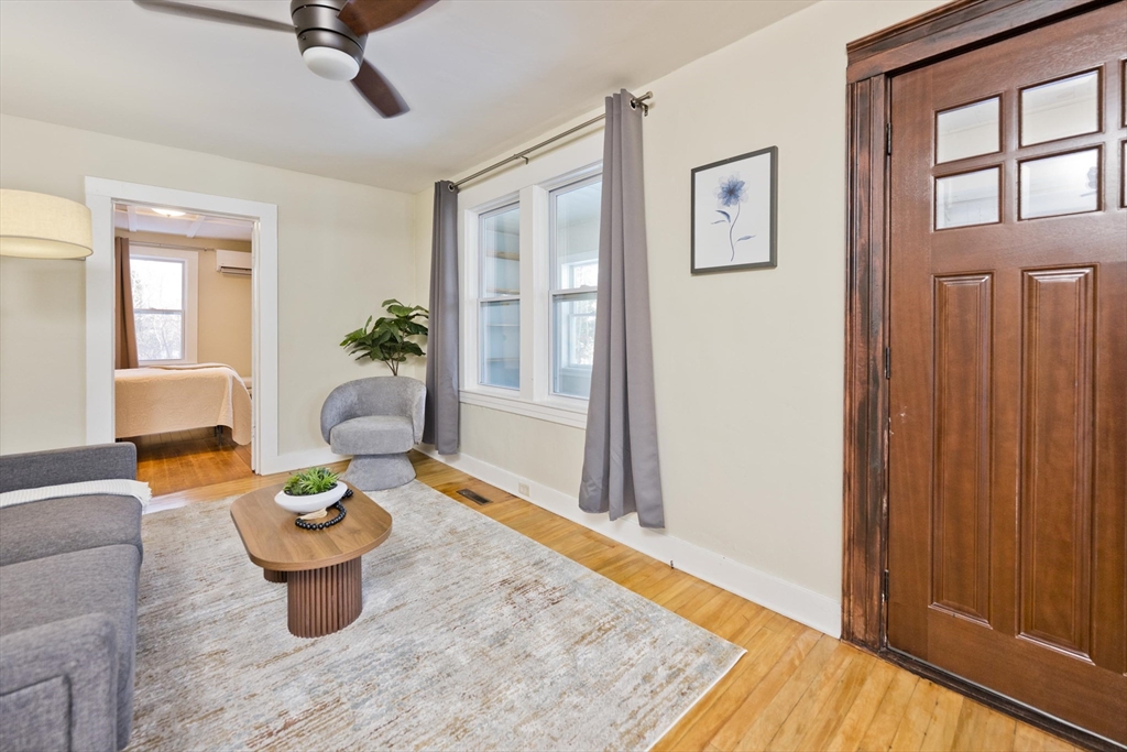 137 Old Amherst Road Belchertown, MA 01007 - Photo 12 of 42 a living room with furniture and a window