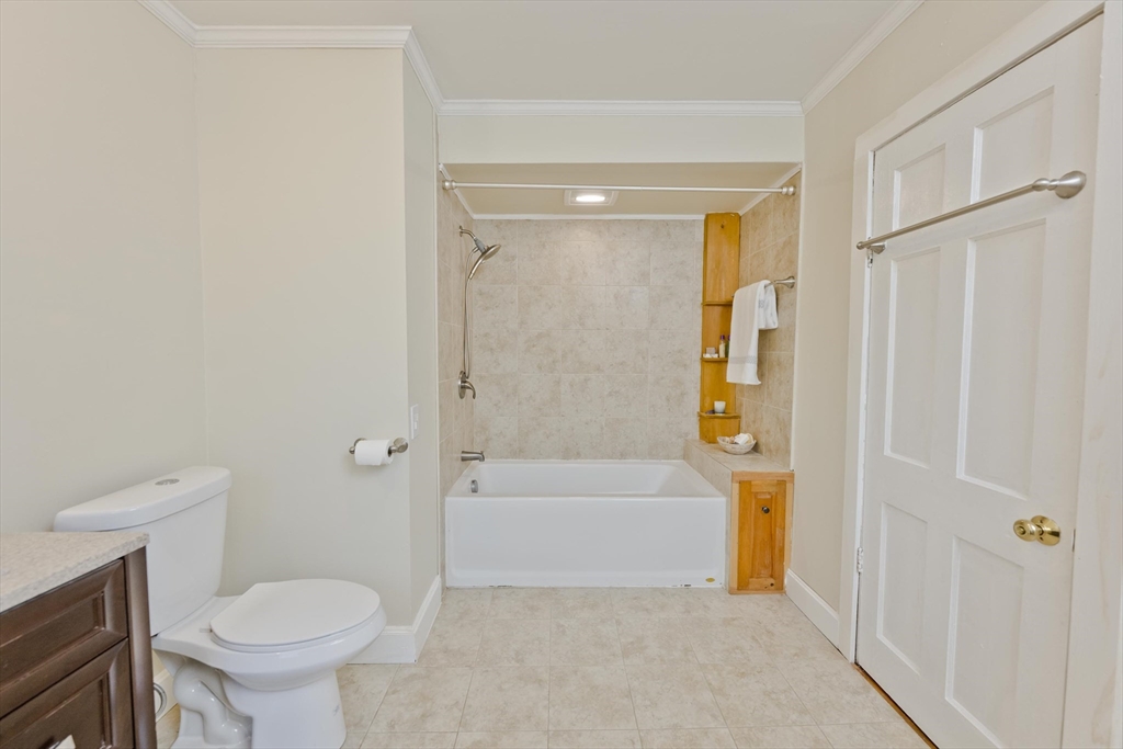 137 Old Amherst Road Belchertown, MA 01007 - Photo 18 of 42 a bathroom with a sink toilet and shower