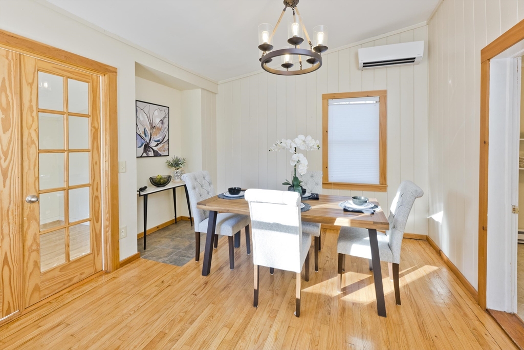 137 Old Amherst Road Belchertown, MA 01007 - Photo 19 of 42 a view of a dining room with furniture window and wooden floor