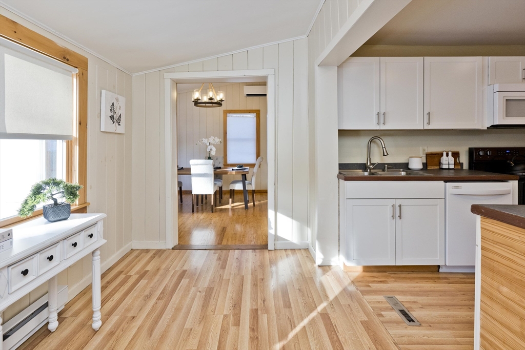 137 Old Amherst Road Belchertown, MA 01007 - Photo 24 of 42 a view of a kitchen with wooden floor