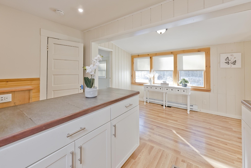 137 Old Amherst Road Belchertown, MA 01007 - Photo 27 of 42 a kitchen with sink and view of living room