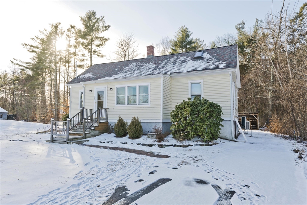 137 Old Amherst Road Belchertown, MA 01007 - Photo 3 of 42 a front view of a house with garden