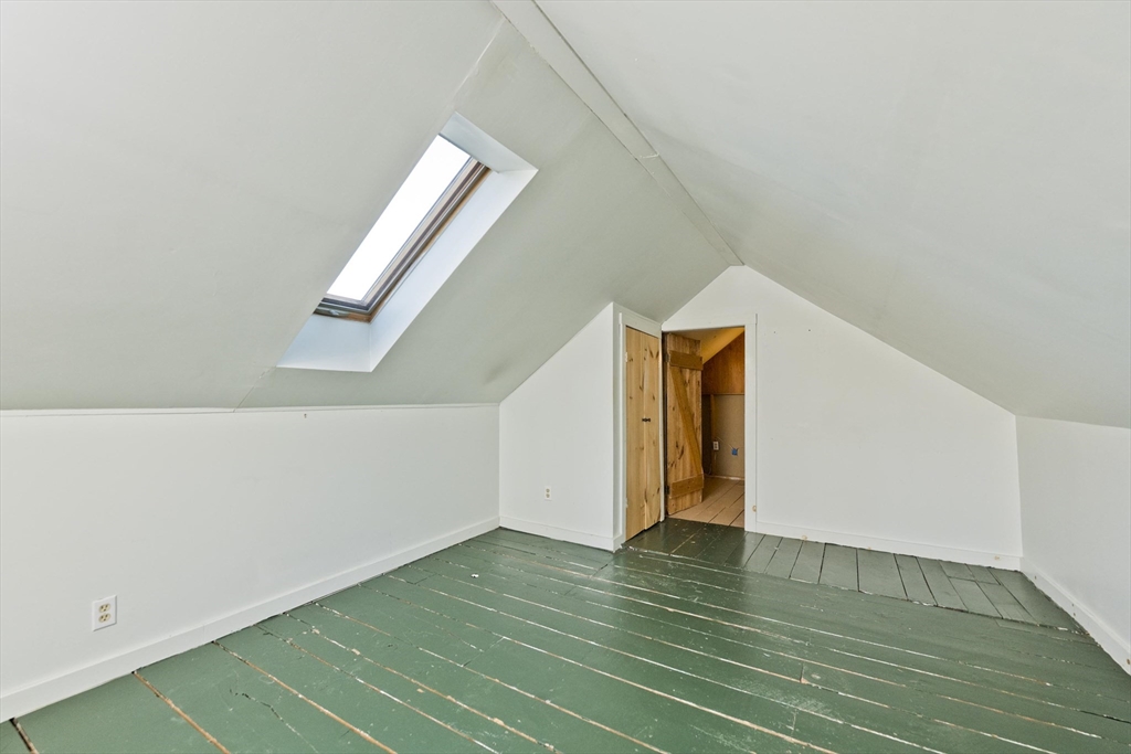 137 Old Amherst Road Belchertown, MA 01007 - Photo 34 of 42 a view of an empty room with wooden floor and closet
