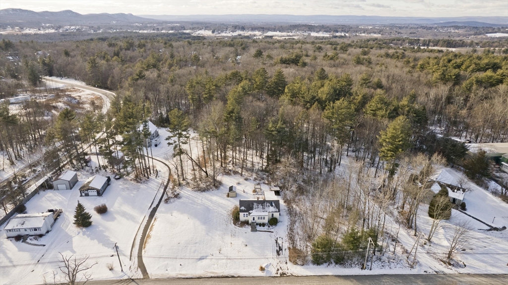 137 Old Amherst Road Belchertown, MA 01007 - Photo 40 of 42 an aerial view of a houses with a yard