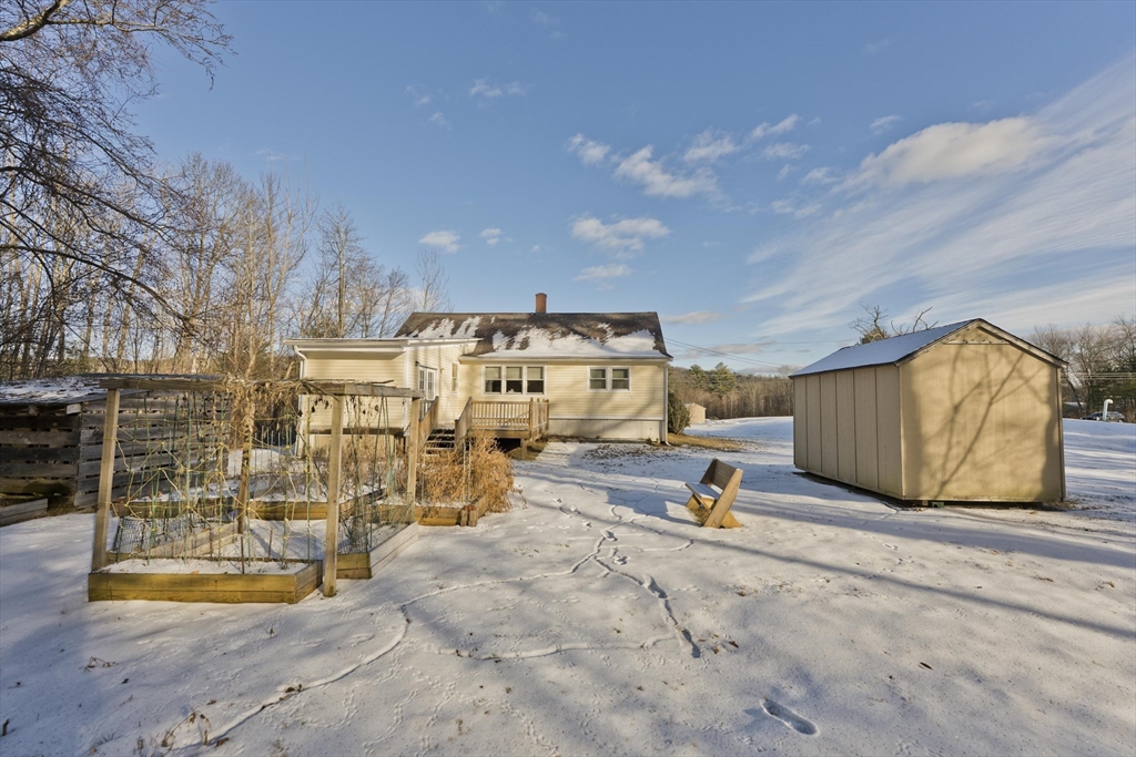 137 Old Amherst Road Belchertown, MA 01007 - Photo 4 of 42 a view of a swimming pool with an outdoor seating