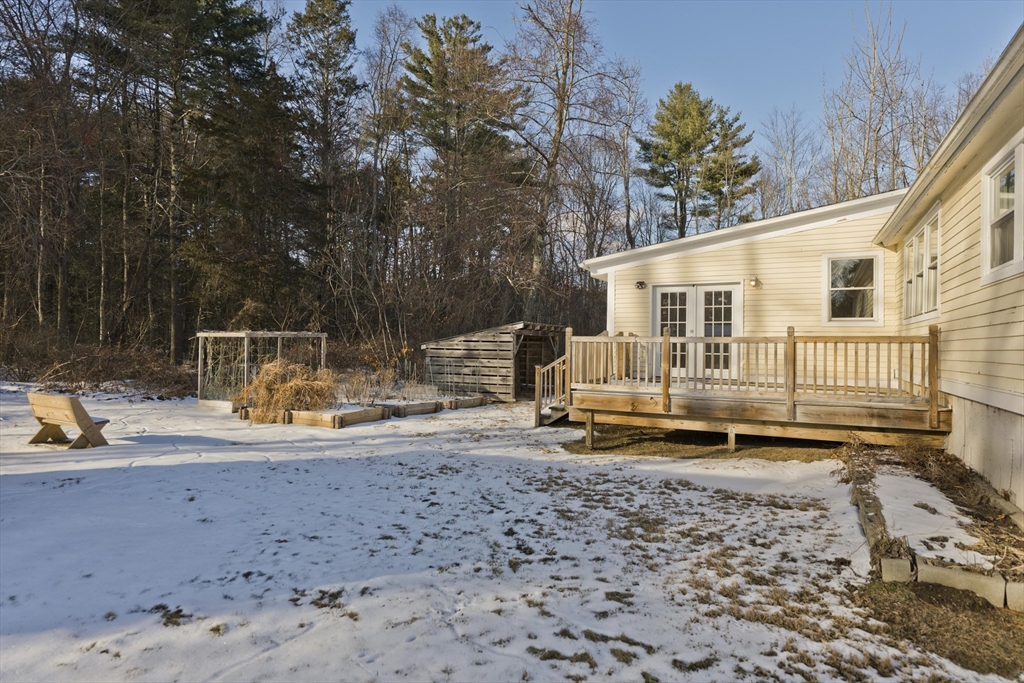 137 Old Amherst Road Belchertown, MA 01007 - Photo 6 of 42 a view of a house with backyard and sitting area