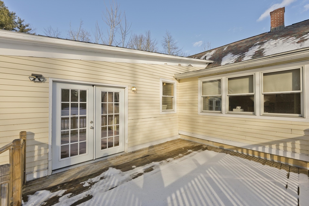 137 Old Amherst Road Belchertown, MA 01007 - Photo 8 of 42 a view of a house with a wooden deck