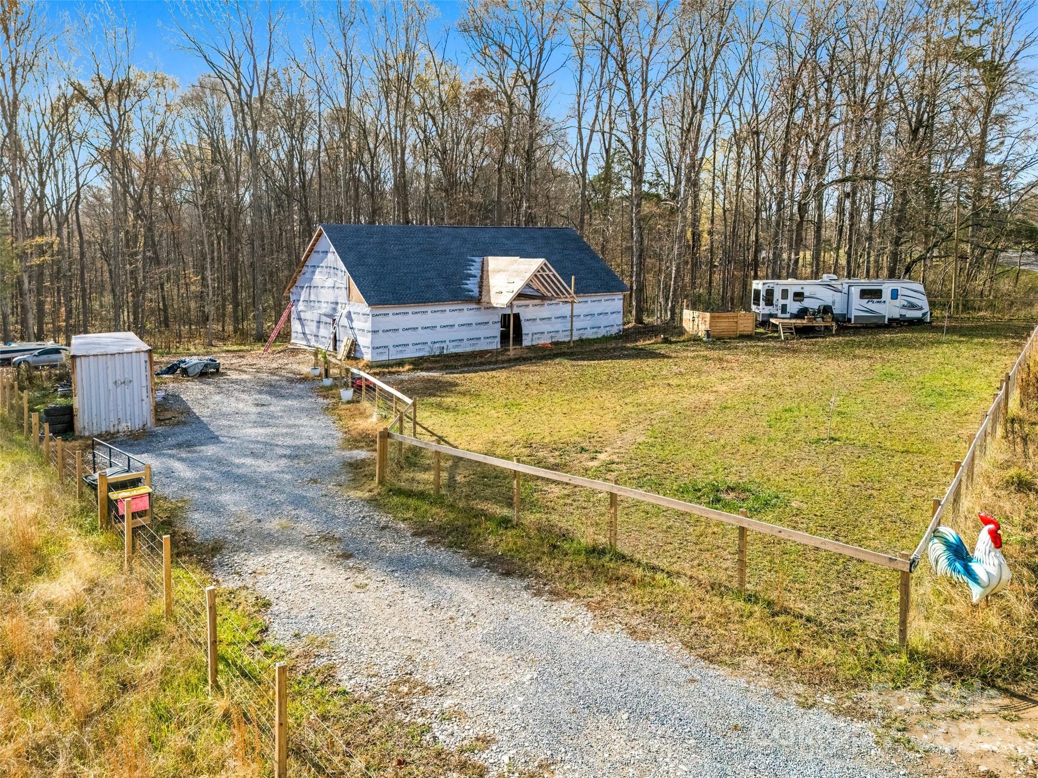 6027 Campbell Road York, SC 29745 - Photo 1 of 10 a view of a swimming pool with some potted plants