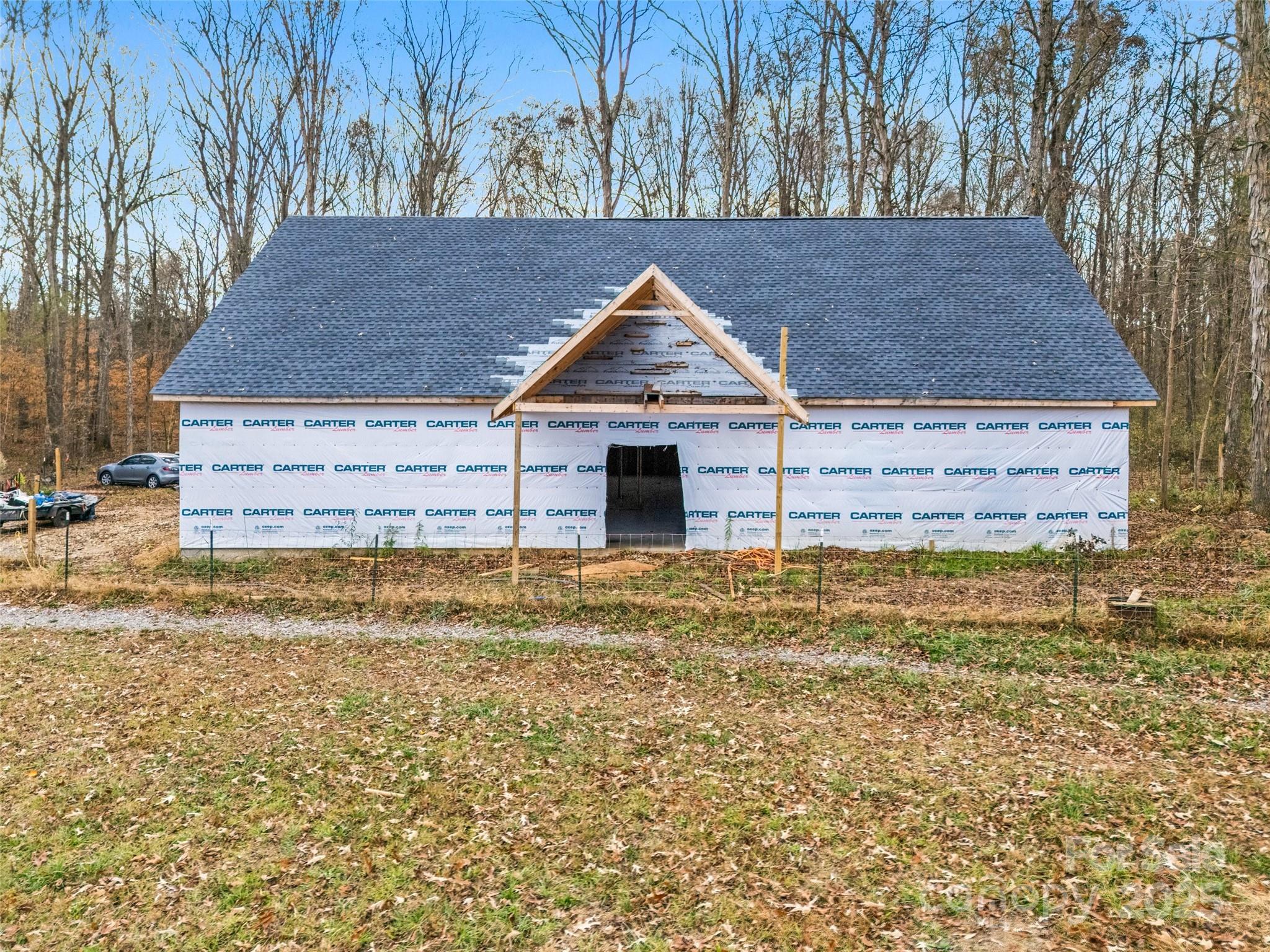 6027 Campbell Road York, SC 29745 - Photo 7 of 10 a front view of a house with a yard