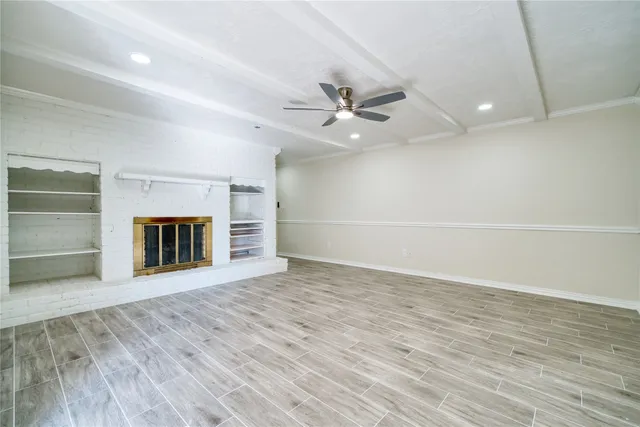 a kitchen with stainless steel appliances granite countertop a sink and a stove