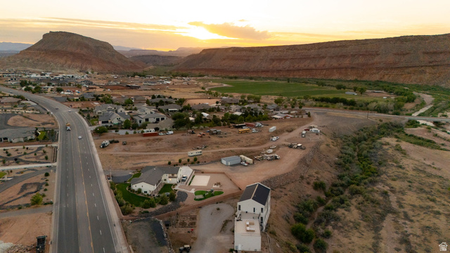 2591 East Washington Dam Road Washington, UT 84780 - Photo 5 of 67 Aerial perspective showcasing an expansive desert landscape with distant mesas