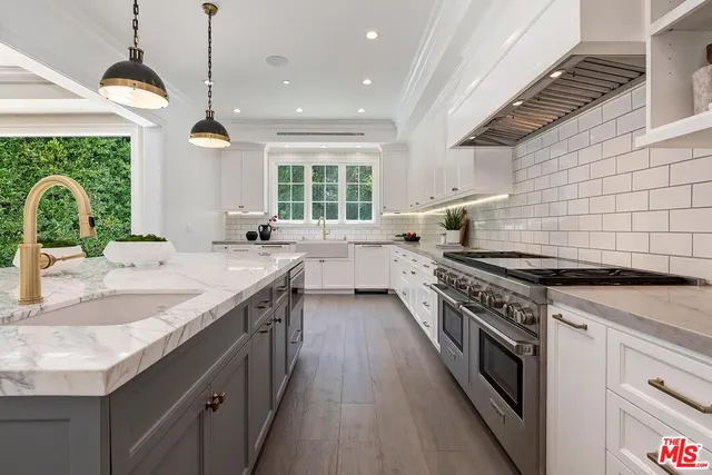 a view of a hallway with a wooden floor