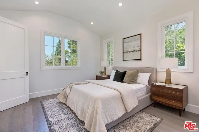 a view of a patio with a table and chairs