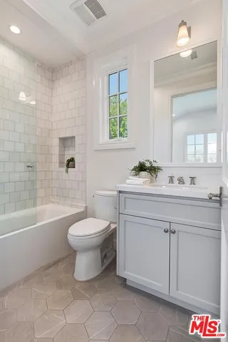 a view of a mini pool with an outdoor seating