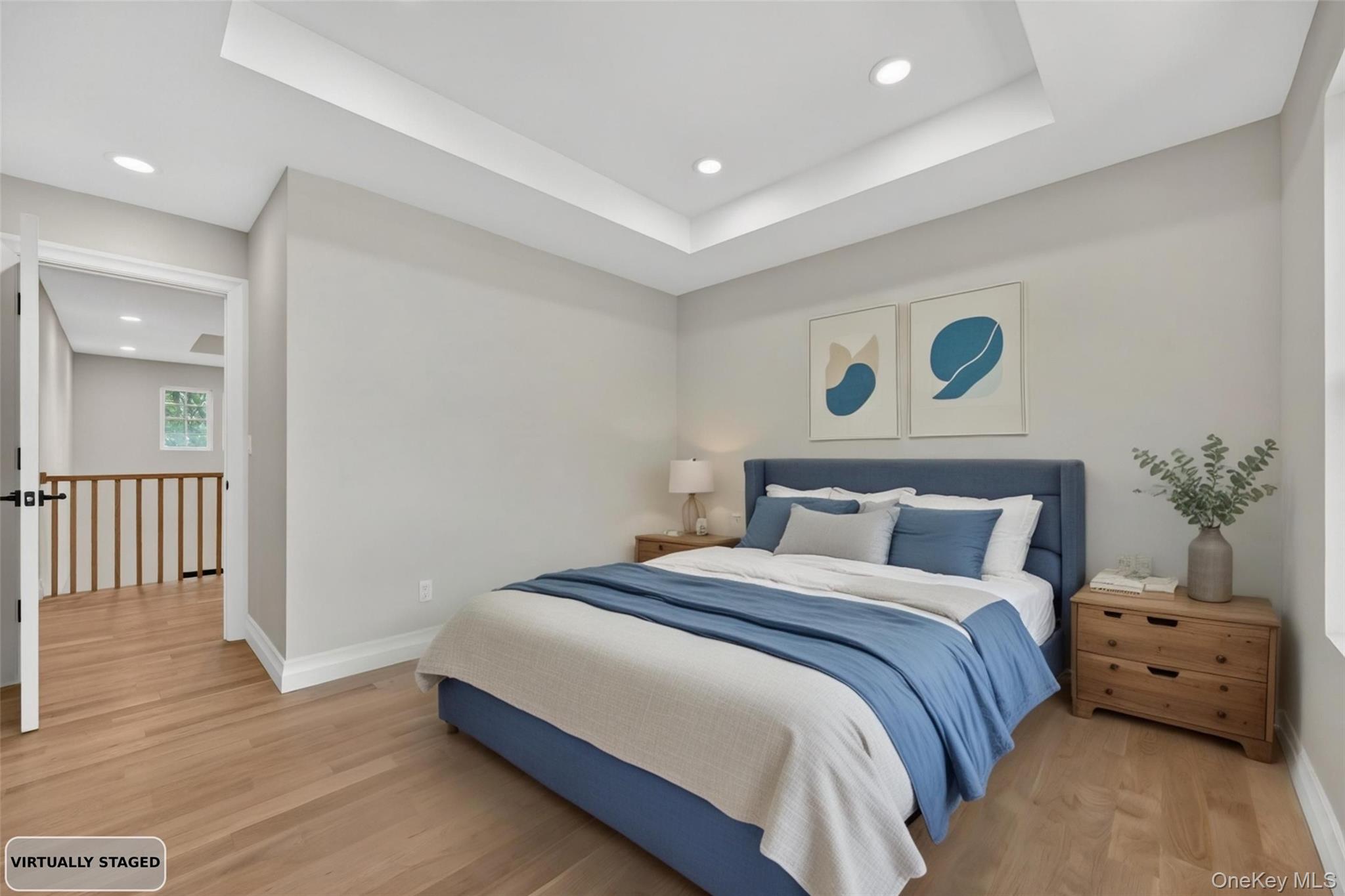 15 Ridge Drive Port Washington, NY 11050 - Photo 27 of 46 a bedroom with a bed and a couch