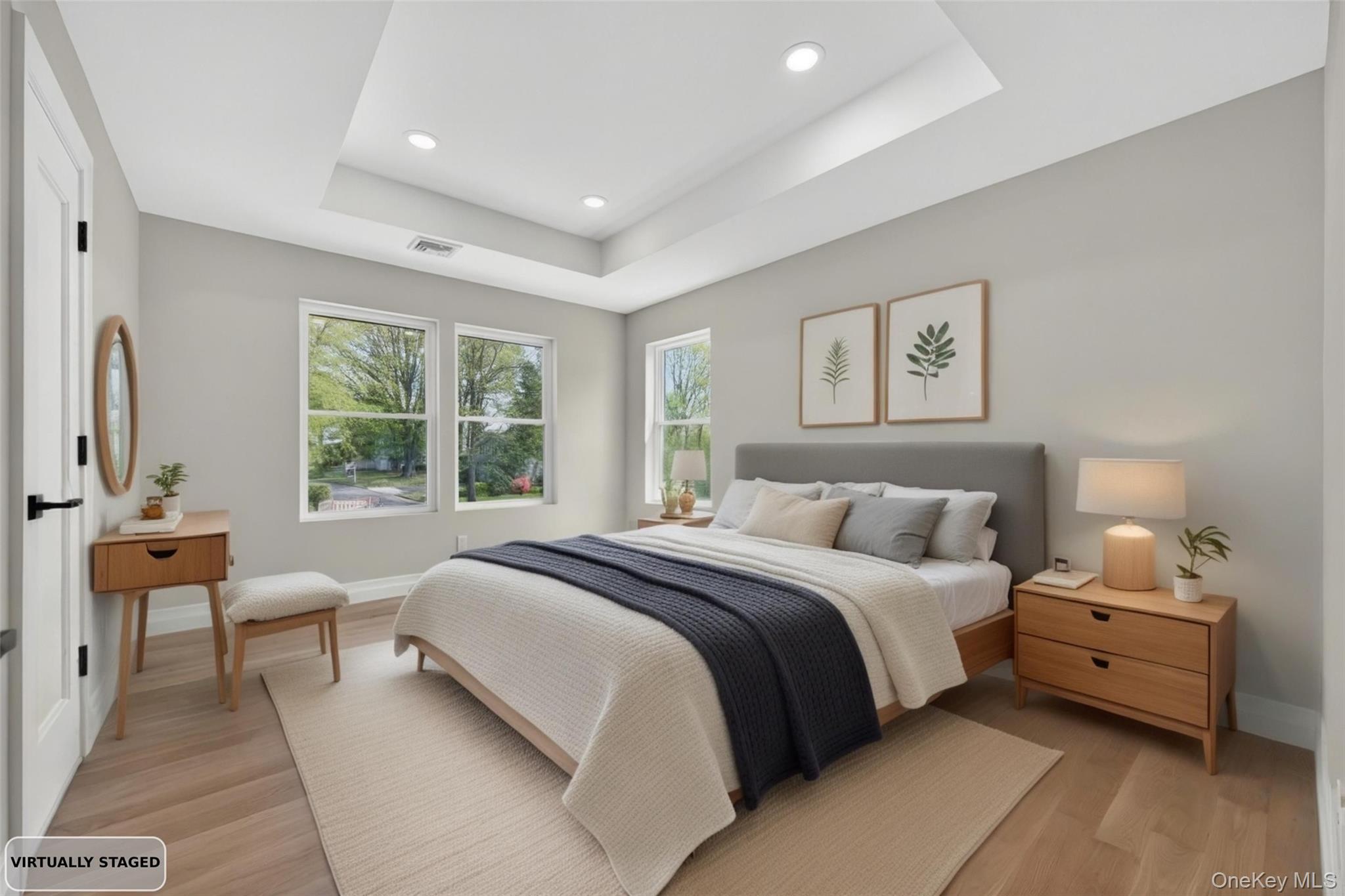 15 Ridge Drive Port Washington, NY 11050 - Photo 30 of 46 a spacious bedroom with a bed and a couch