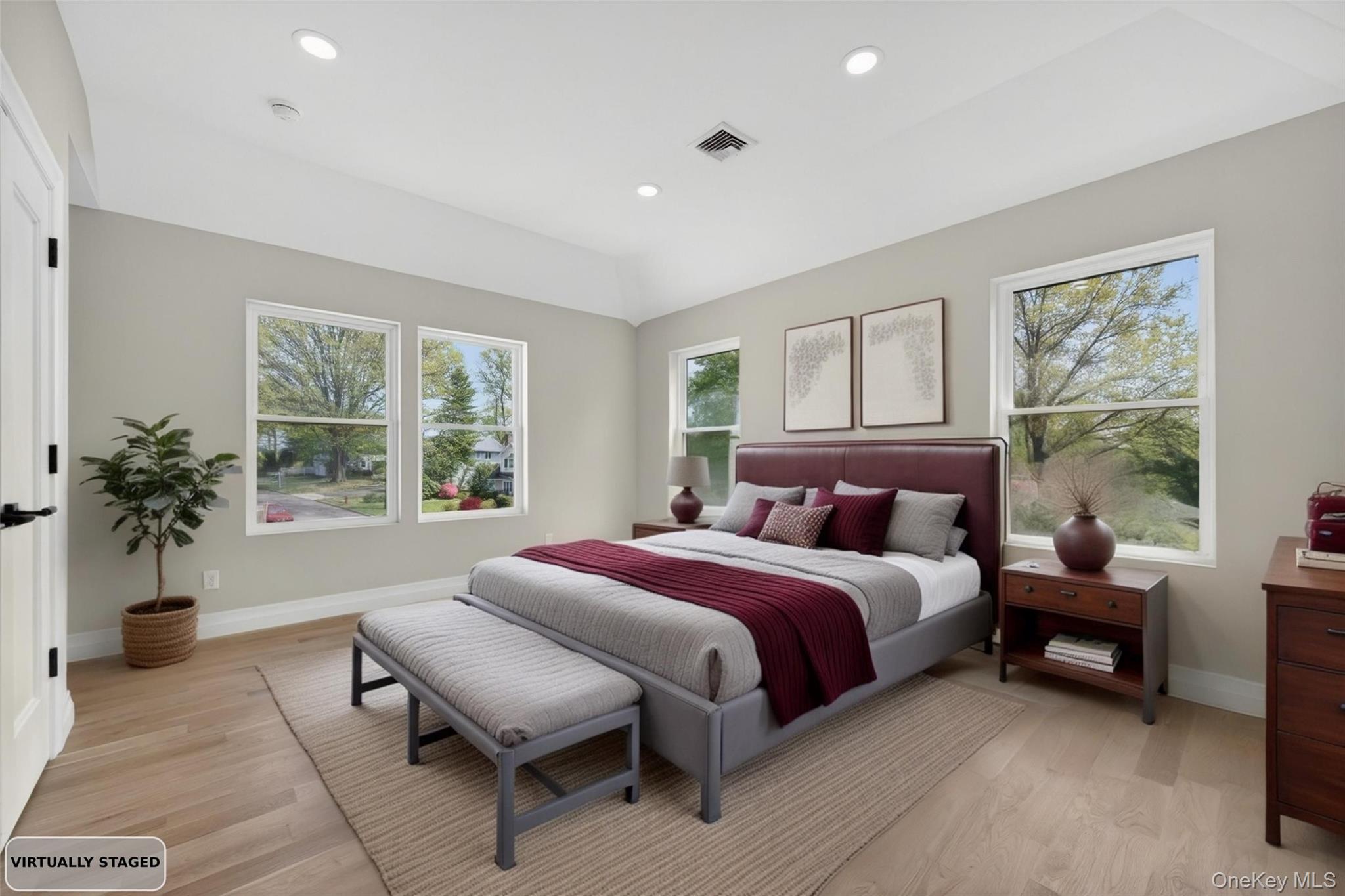 15 Ridge Drive Port Washington, NY 11050 - Photo 32 of 46 a bedroom with a bed and a window