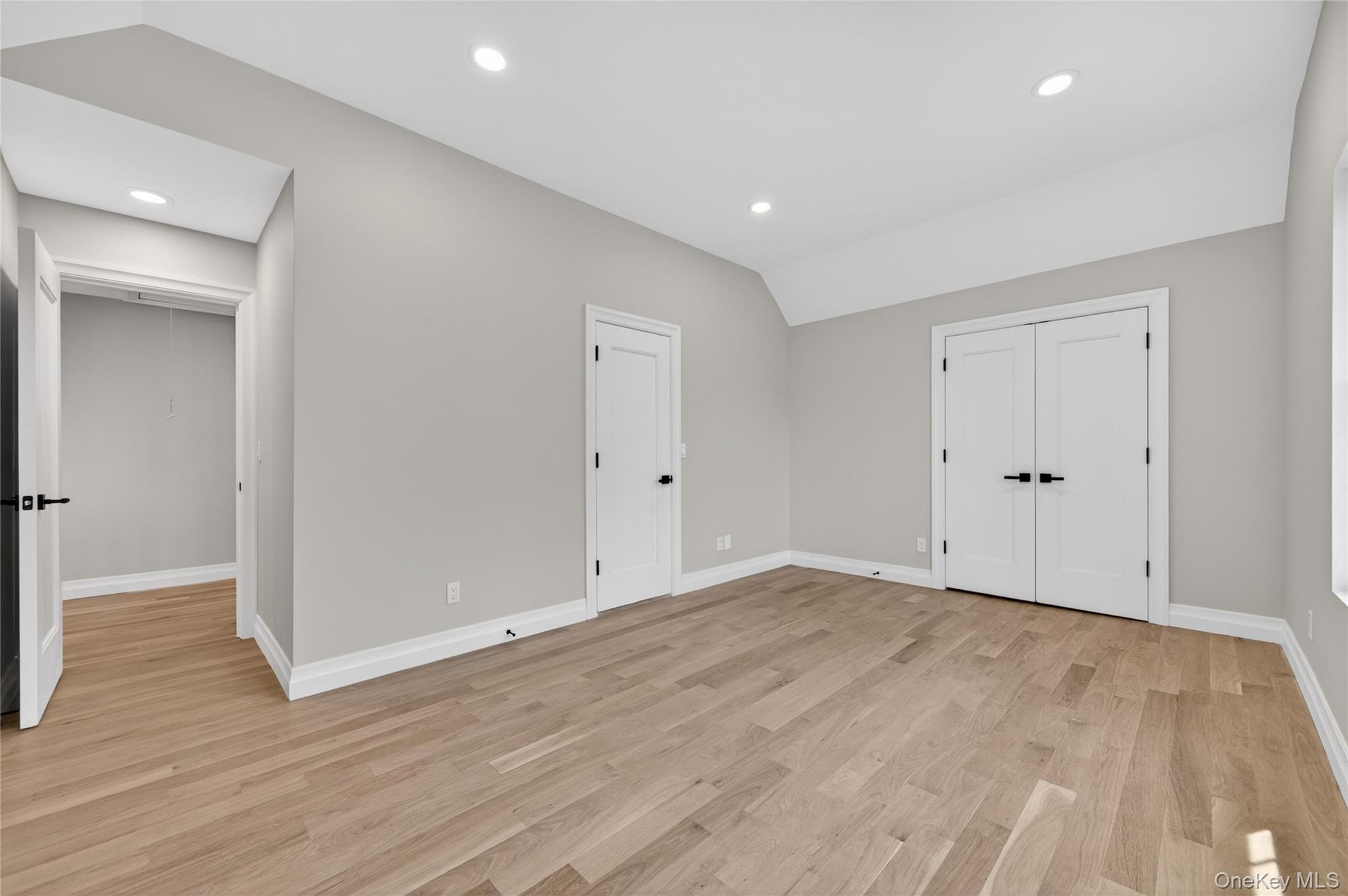 15 Ridge Drive Port Washington, NY 11050 - Photo 35 of 46 a view of room with wooden floor