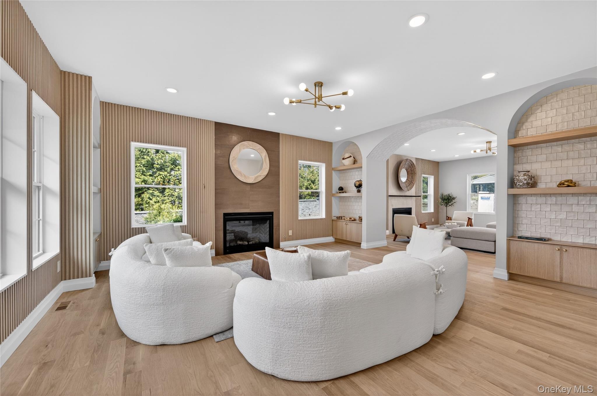 15 Ridge Drive Port Washington, NY 11050 - Photo 4 of 46 a living room with fireplace furniture and a fireplace