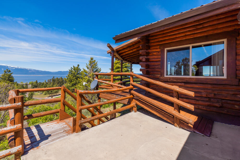 34840 Dawn Loop Chiloquin, OR 97624 - Photo 20 of 91 a backyard of a house with wooden floor and outdoor seating