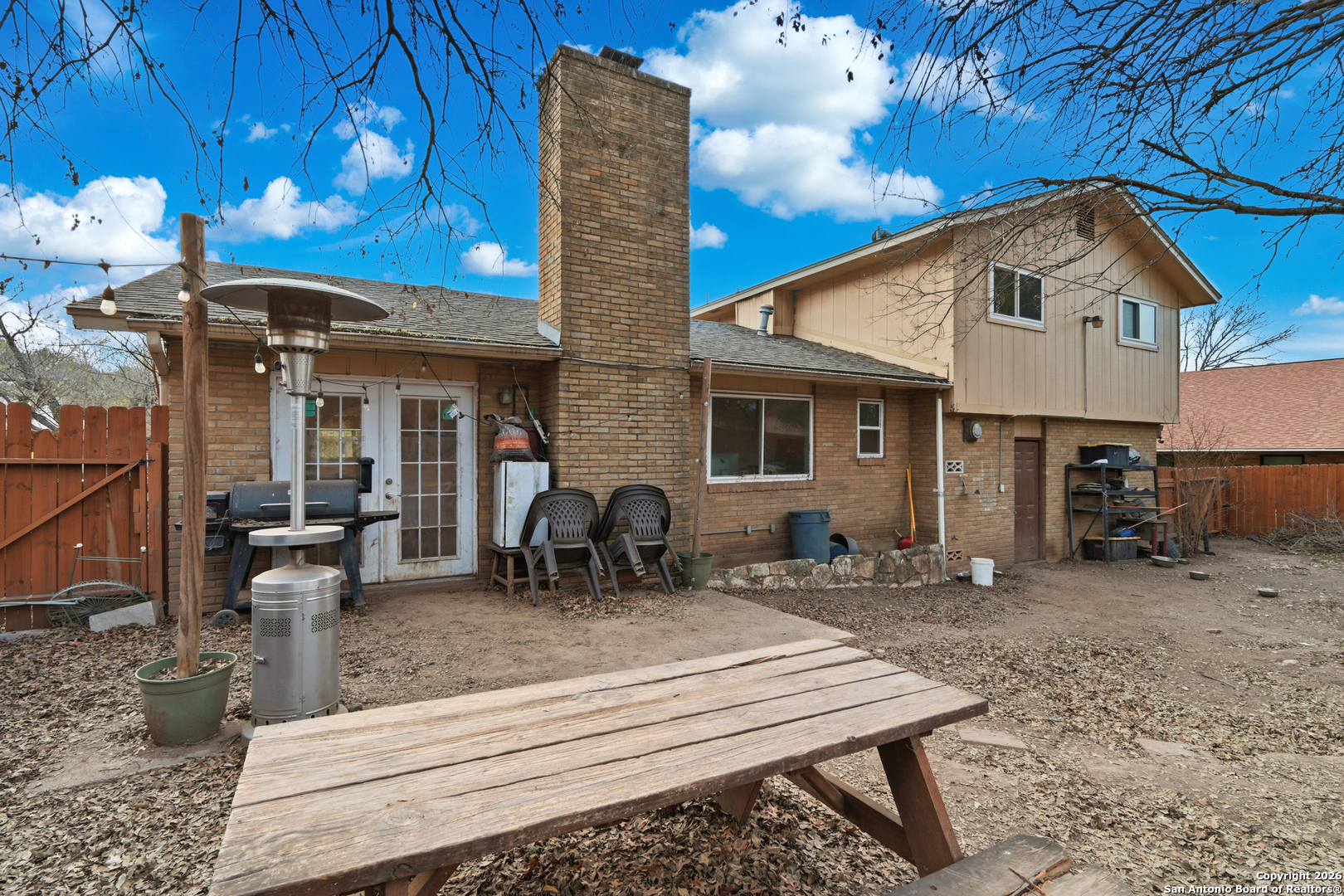 6113 Sun Dial Street Leon Valley, TX 78238 - Photo 20 of 21 a view of a house with a patio