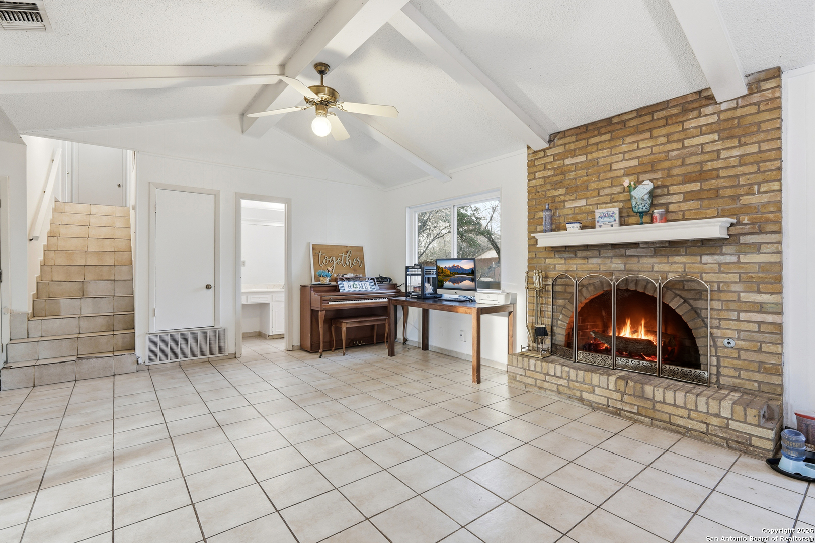 6113 Sun Dial Street Leon Valley, TX 78238 - Photo 6 of 21 a living room with furniture and a fireplace