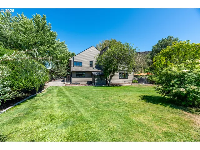 a house view with a garden space