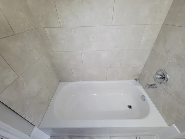 a bathroom with a bathtub