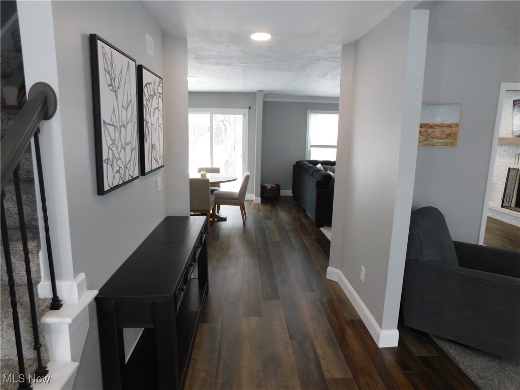 3273 Anglo Circle Northwest Canton, OH 44708 - Photo 4 of 33 Hallway with new laminate flooring