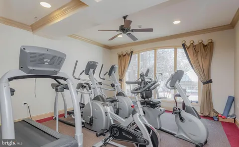 a view of a playground with basketball court