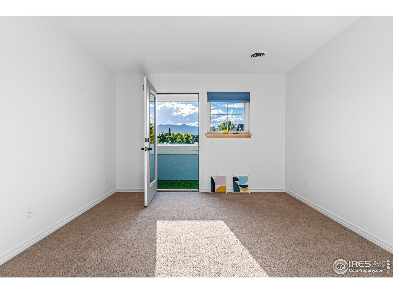 3766 Ridgeway Street Boulder, CO 80301 - Photo 30 of 42 Third bedroom on same level - private balcony off of bedroom overlooking the foothills