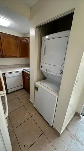 a utility room with washer and dryer