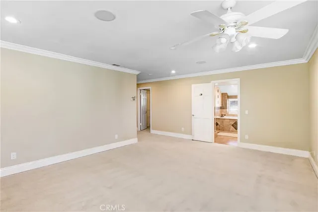 a large bathroom with a large tub sink and double vanity