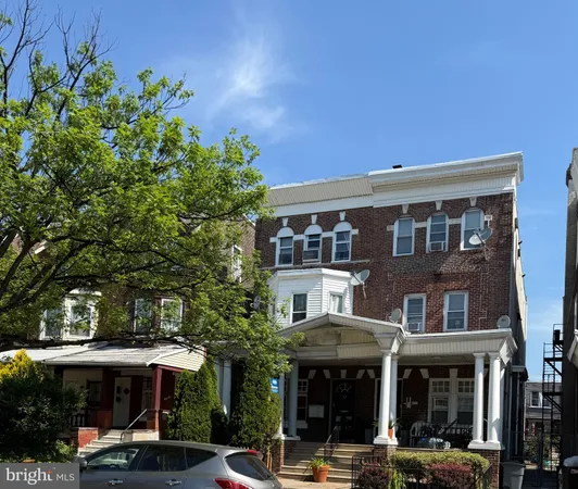 a front view of a building with street view