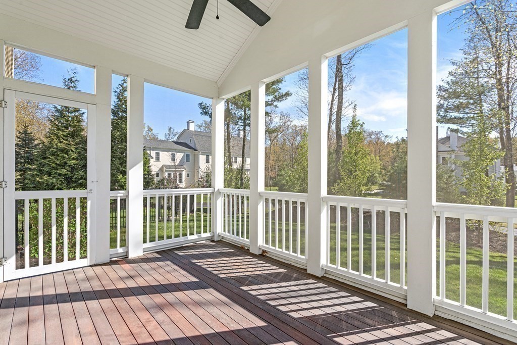 5 Cider Circle Bolton, MA 01740 - Photo 13 of 42 a view of a balcony with wooden floor
