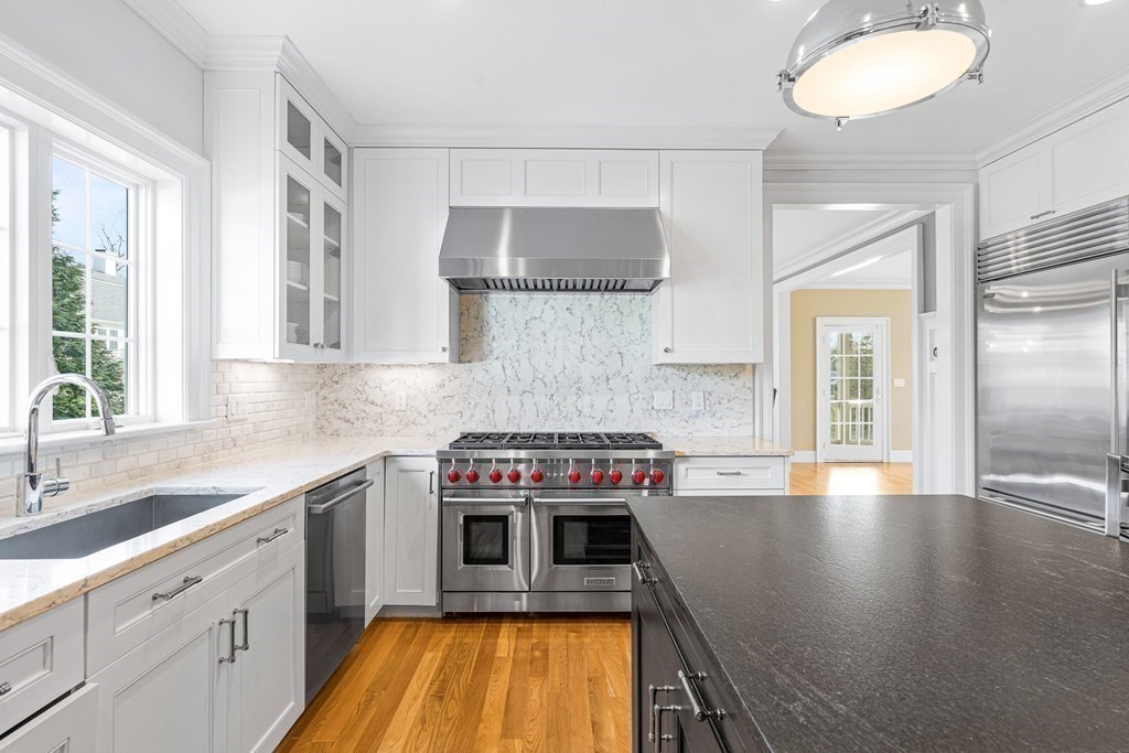 5 Cider Circle Bolton, MA 01740 - Photo 20 of 42 a kitchen with stainless steel appliances granite countertop a stove and a sink