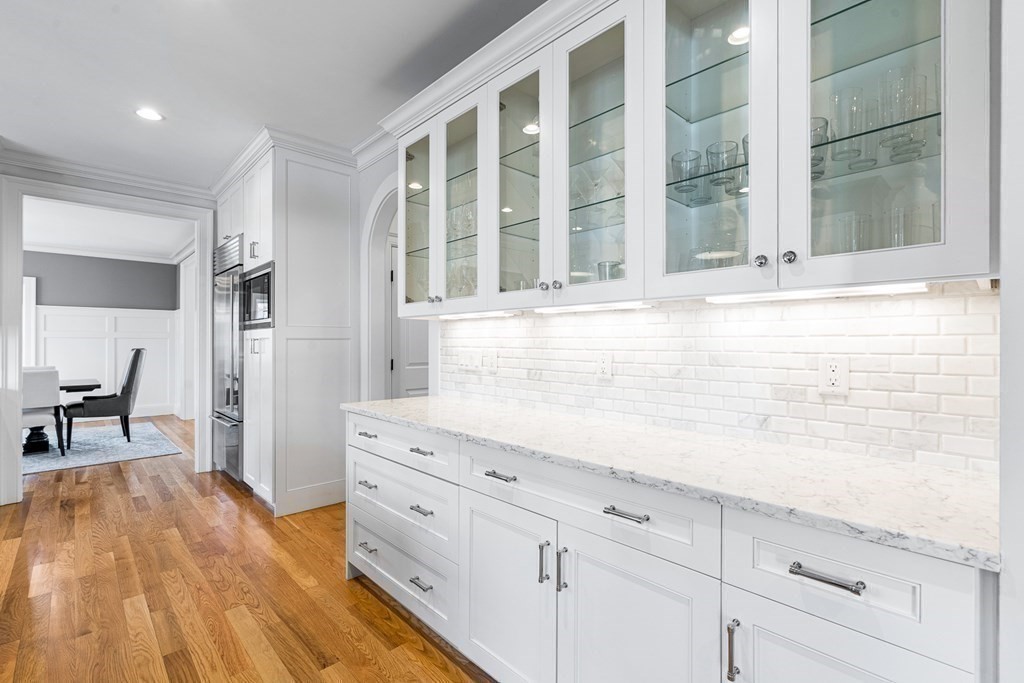 5 Cider Circle Bolton, MA 01740 - Photo 21 of 42 a view of a kitchen with cabinets and wooden floor