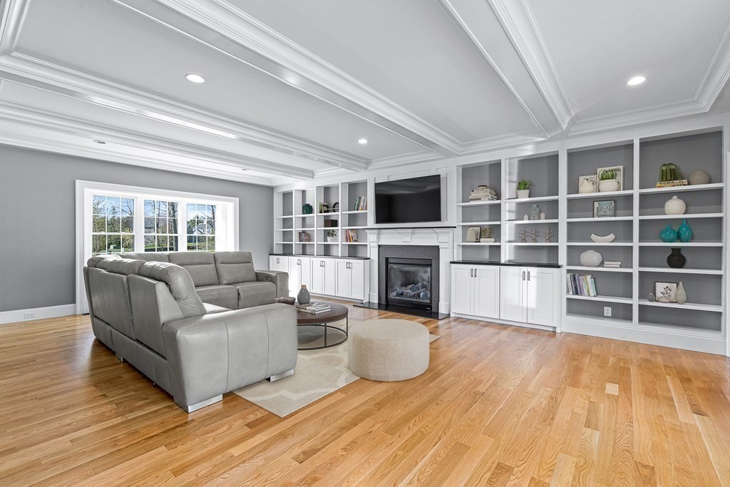 5 Cider Circle Bolton, MA 01740 - Photo 23 of 42 a living room with furniture windows and a fireplace