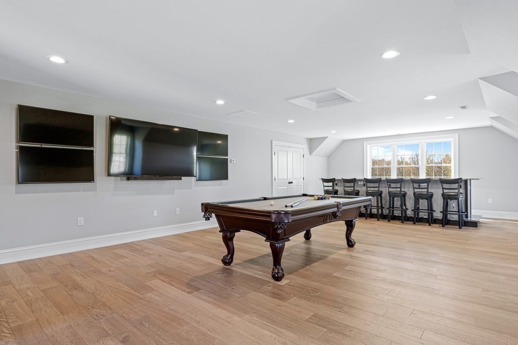5 Cider Circle Bolton, MA 01740 - Photo 25 of 42 a living room with furniture and a flat screen tv