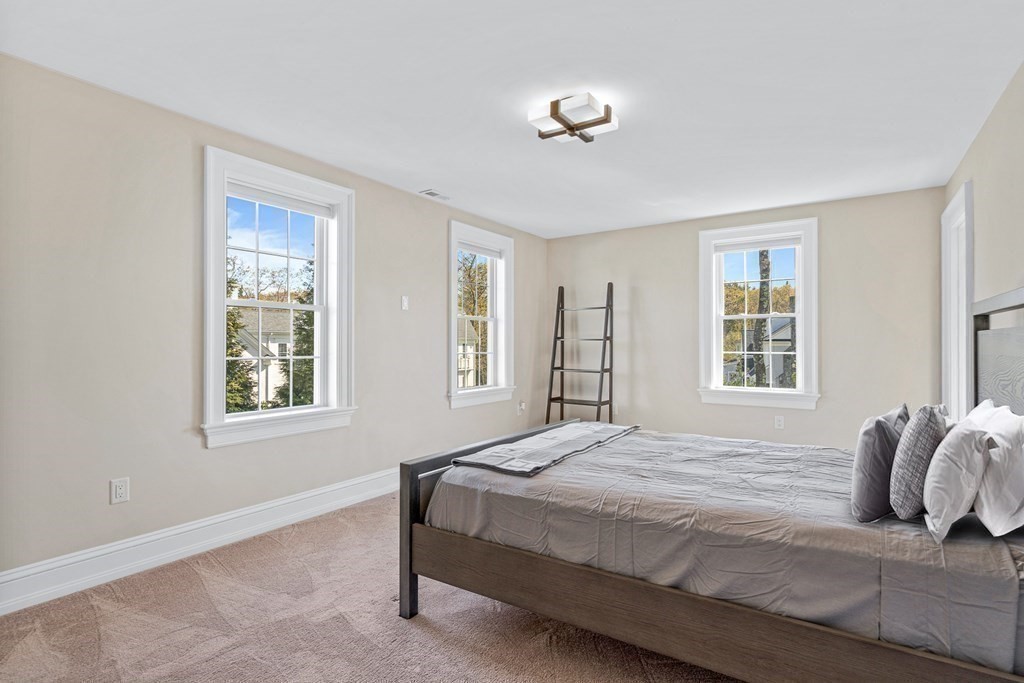 5 Cider Circle Bolton, MA 01740 - Photo 29 of 42 a bedroom with a bed and a window