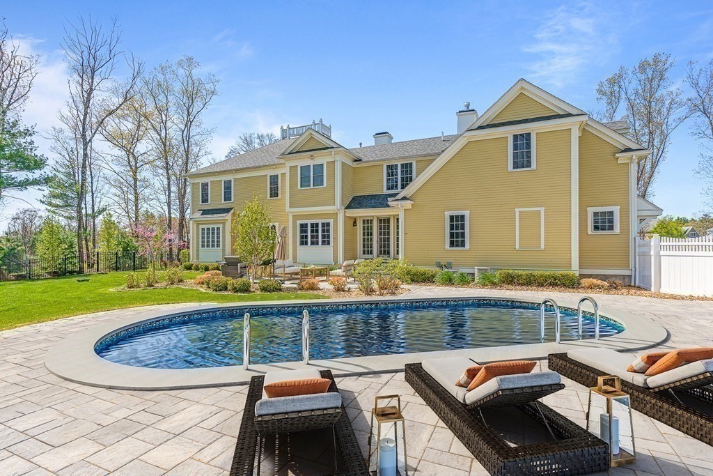 5 Cider Circle Bolton, MA 01740 - Photo 38 of 42 a front view of a house with swimming pool having outdoor seating