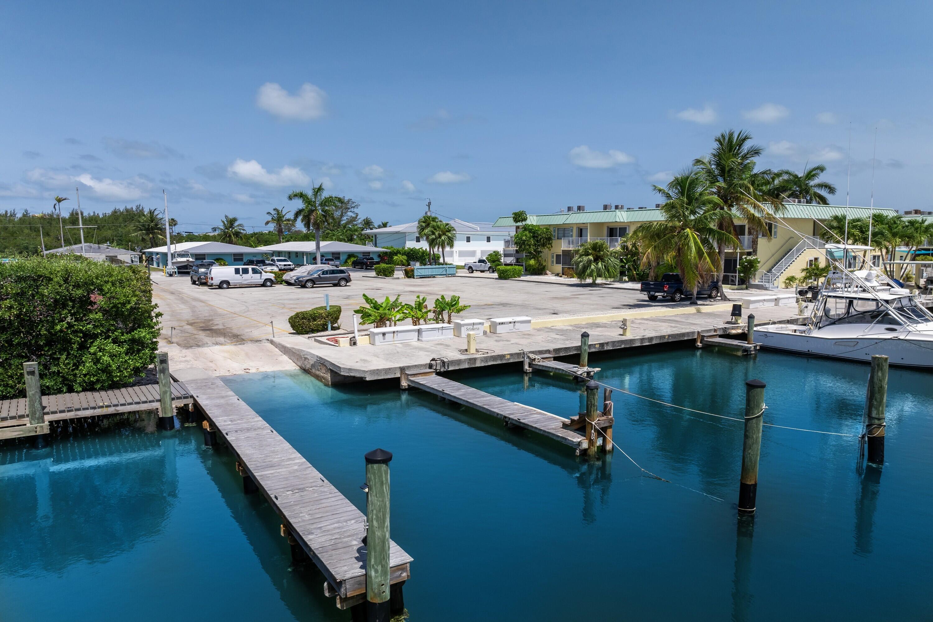 105 Ave D, Unit 101 Marathon, FL 33050 - Photo 1 of 32 a view of a lake with couches chairs
