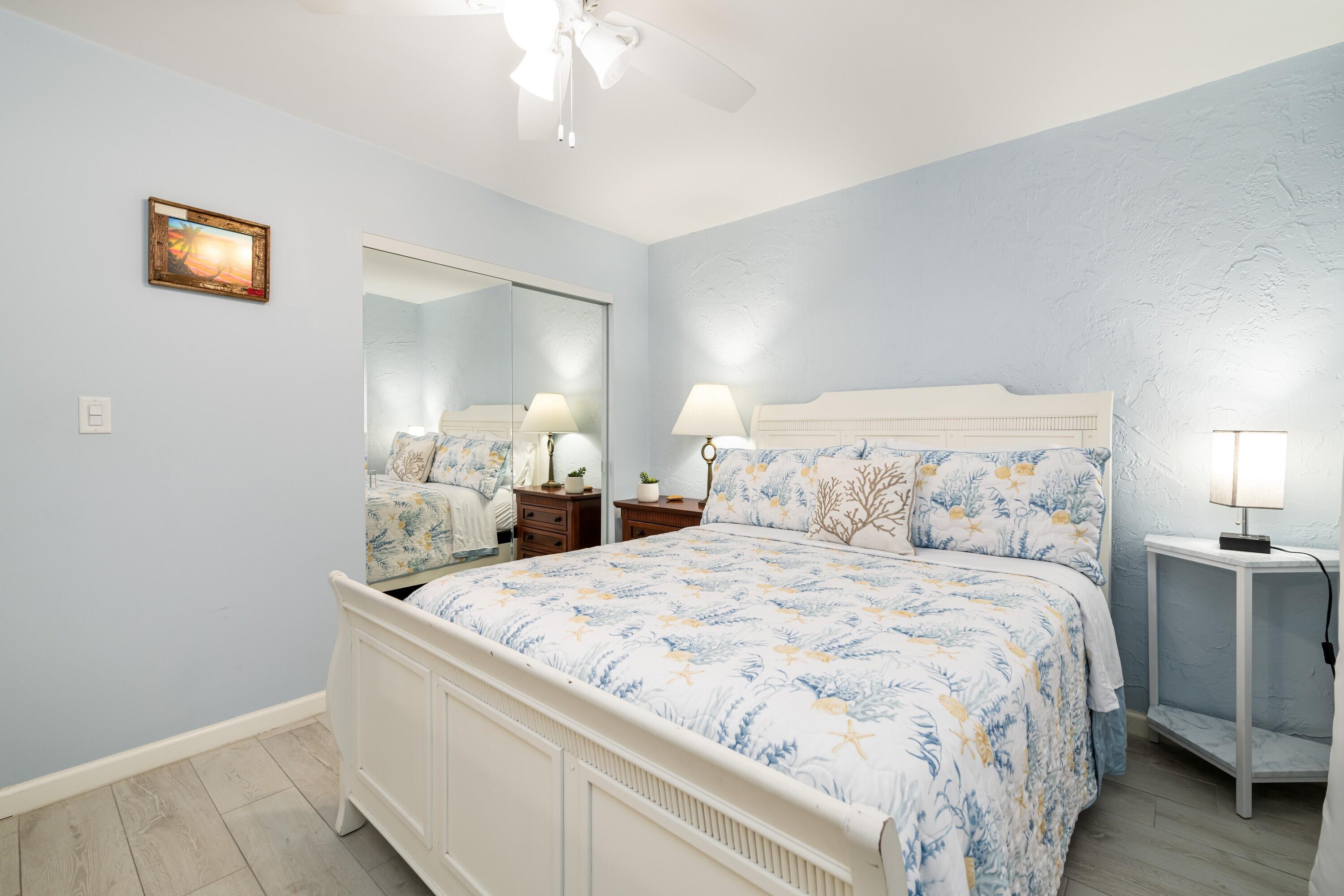 105 Ave D, Unit 101 Marathon, FL 33050 - Photo 16 of 32 a large white bed in a white room