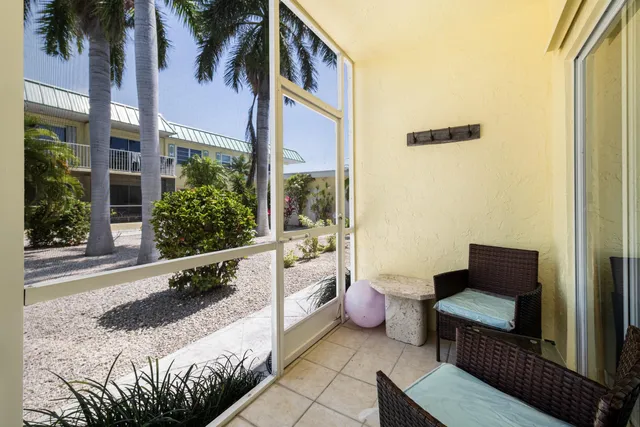 a building outdoor space with patio furniture