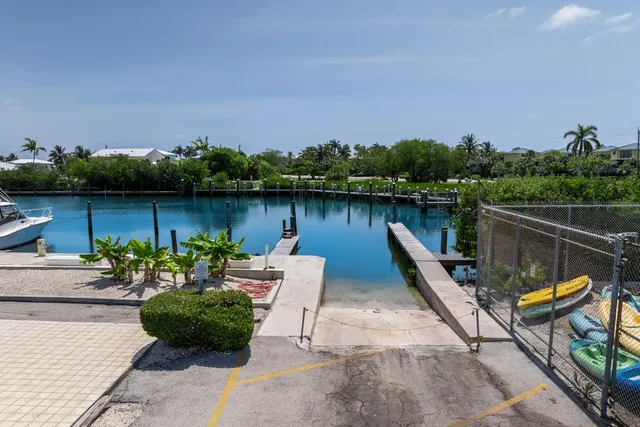 a view of a lake with a sitting space