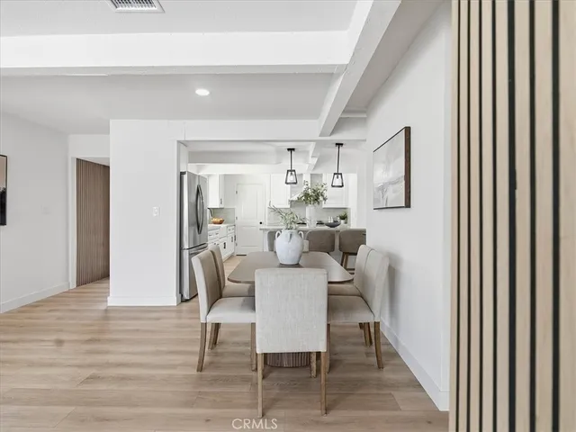 a stove top oven sitting inside of a kitchen