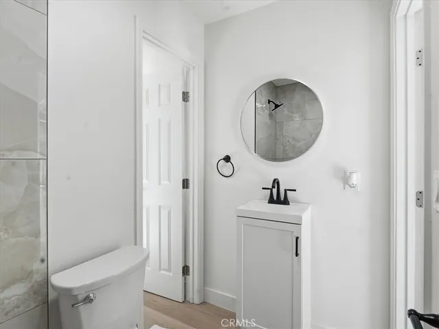 a bathroom with a sink and mirror