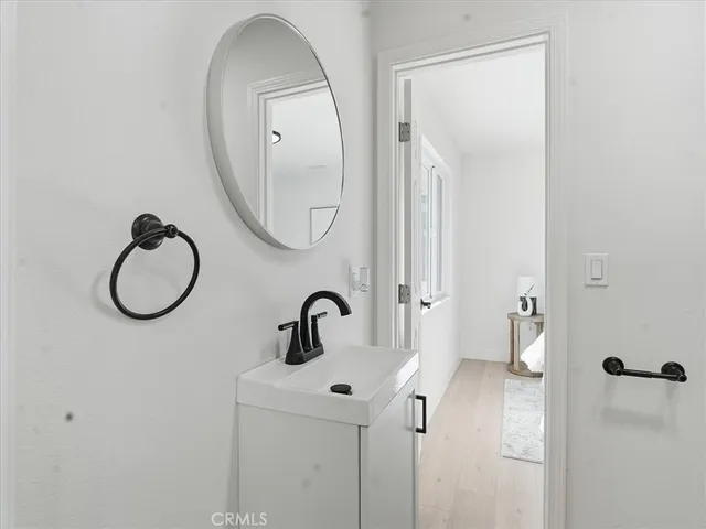 a bathroom with a toilet and a sink