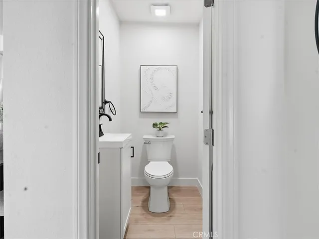a bathroom with a shower and a toilet