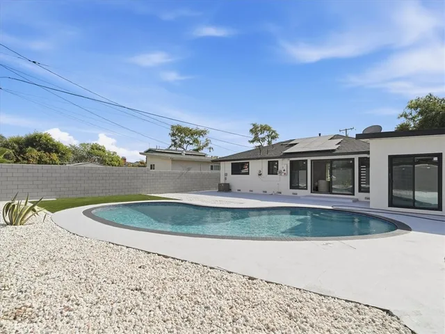 front view of a house with a street